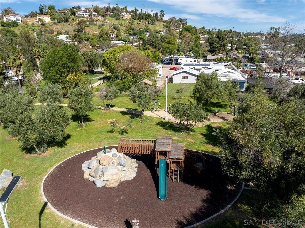 3143 Lamar Court Spring Valley, CA 91977 - Photo 39 of 40 an aerial view of a house with a yard and lake view