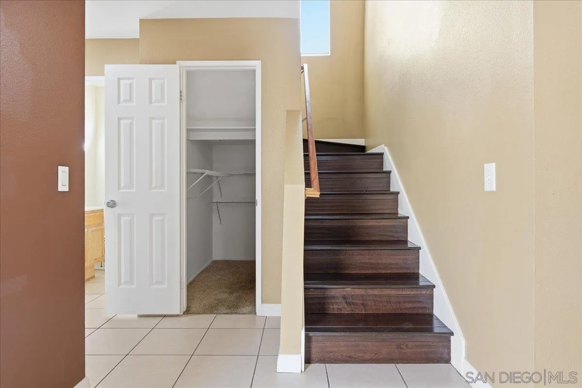 3143 Lamar Court Spring Valley, CA 91977 - Photo 8 of 40 a view of entryway and hall with wooden floor