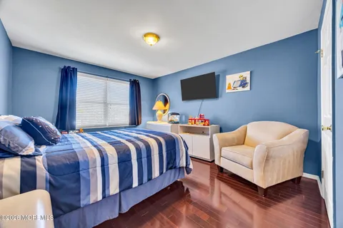 a bath tub sitting in a bathroom next to a window