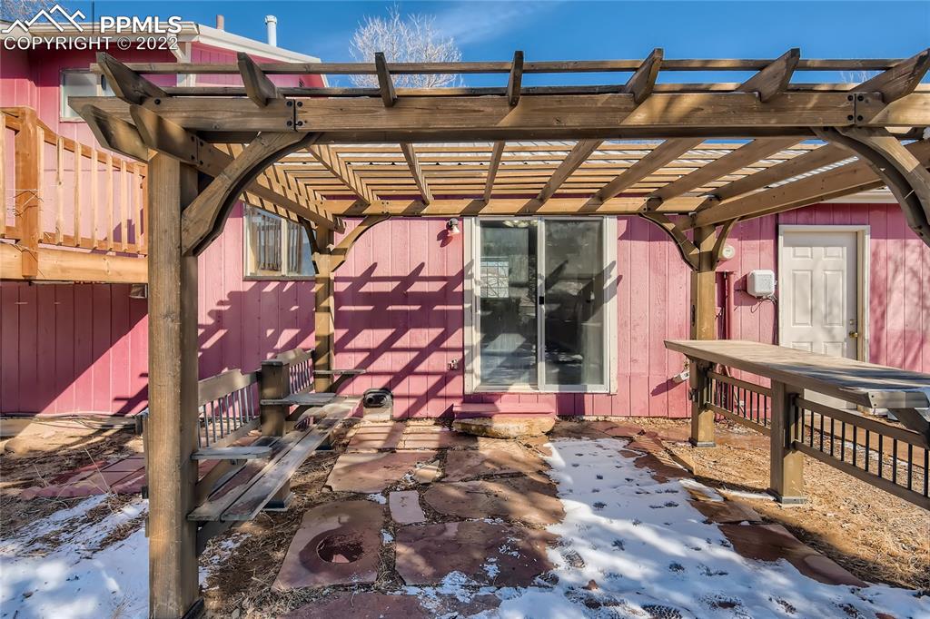 2030 Chelton Road Colorado Springs, CO 80916 - Photo 25 of 33 a view of entryway with outdoor area