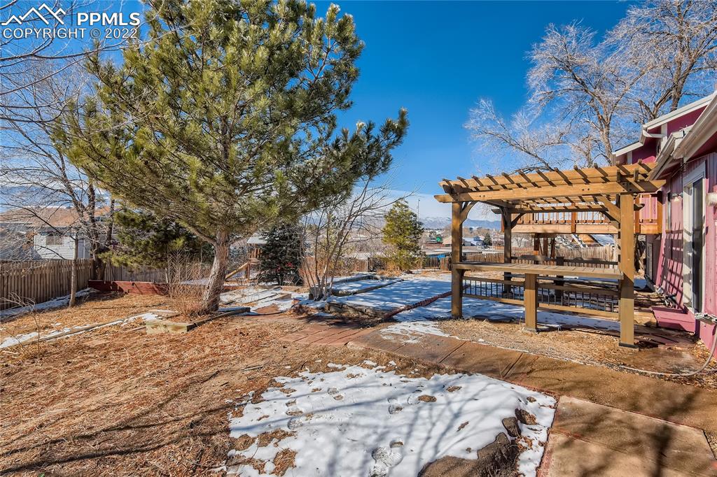 2030 Chelton Road Colorado Springs, CO 80916 - Photo 27 of 33 a view of outdoor space with seating