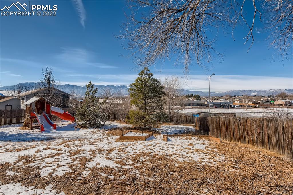 2030 Chelton Road Colorado Springs, CO 80916 - Photo 31 of 33 a view of a lake with a park