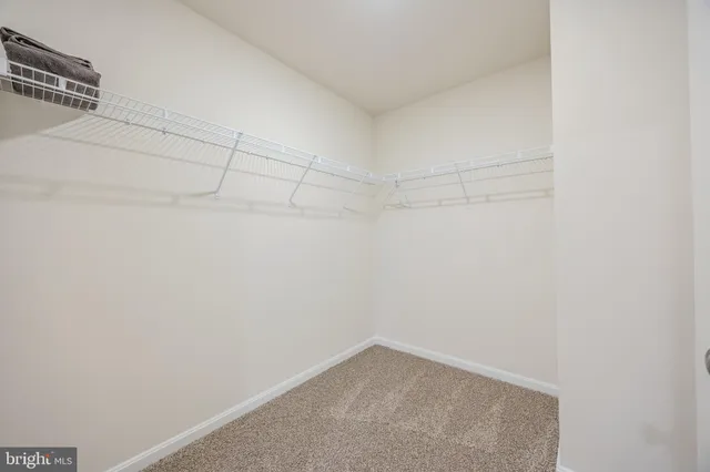 a view of a swimming pool with a yard