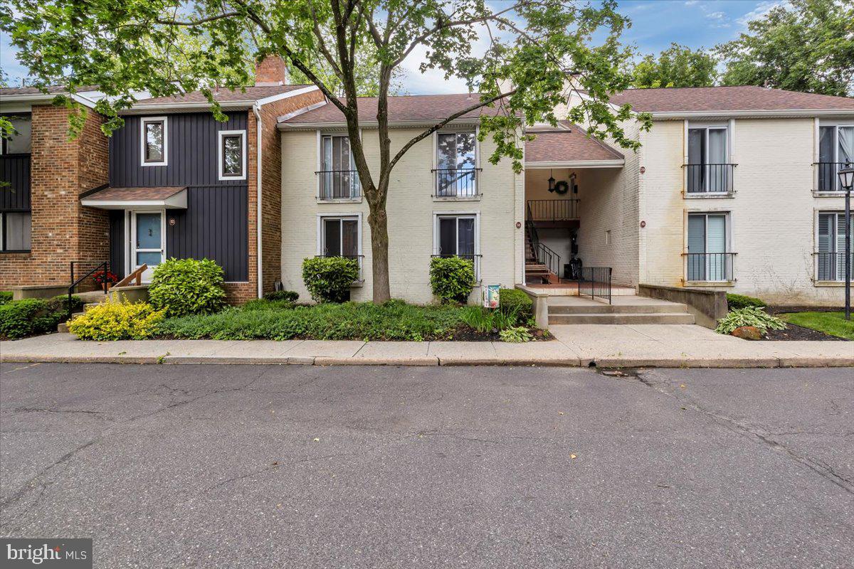 front view of a house with a small yard