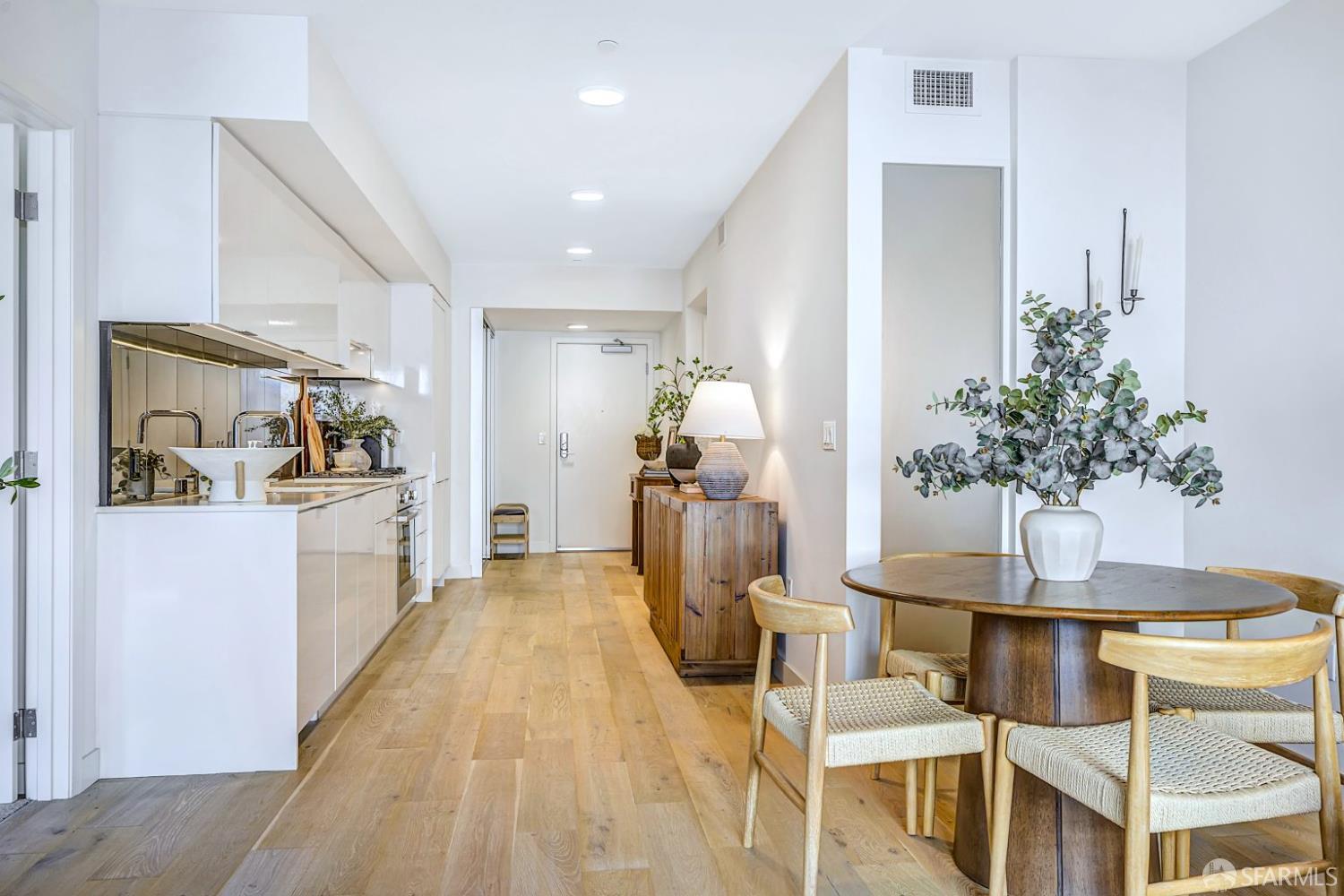 99 Rausch Street, Unit 214 San Francisco, CA 94103 - Photo 16 of 73 a dining room with furniture and window