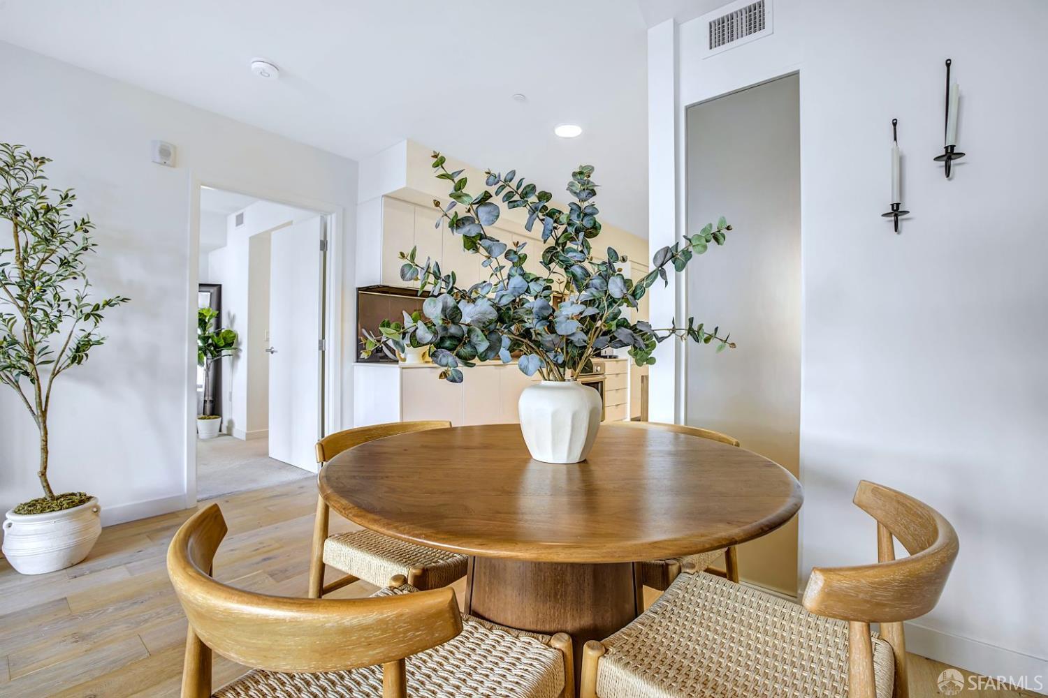 99 Rausch Street, Unit 214 San Francisco, CA 94103 - Photo 18 of 73 a dining room with furniture and wooden floor