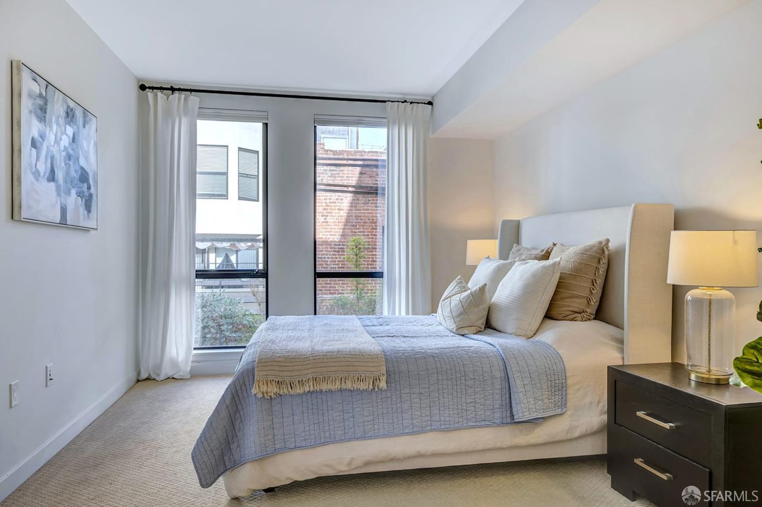 99 Rausch Street, Unit 214 San Francisco, CA 94103 - Photo 29 of 73 a bedroom with a bed and window