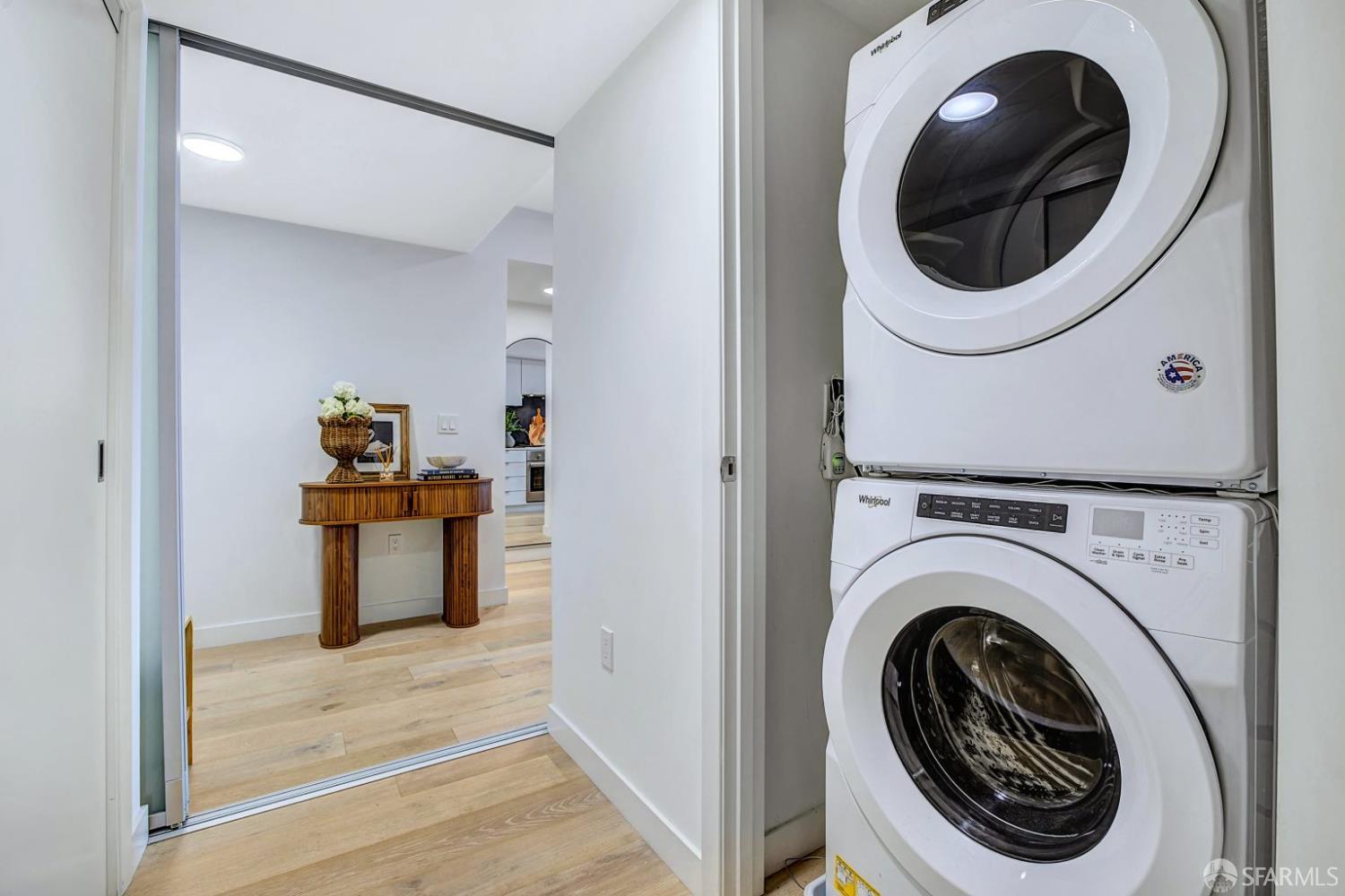 99 Rausch Street, Unit 214 San Francisco, CA 94103 - Photo 37 of 73 a view of a hallway with washer and dryer