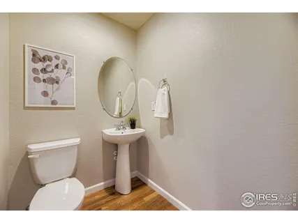 a bathroom with a toilet and a sink