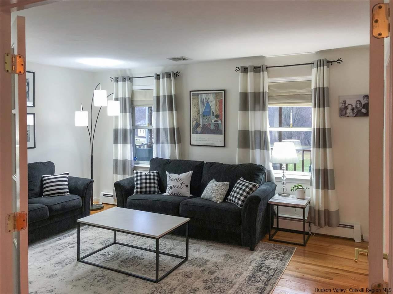 399 Collabar Road Montgomery, NY 12549 - Photo 5 of 26 a living room with furniture and a walk in closet