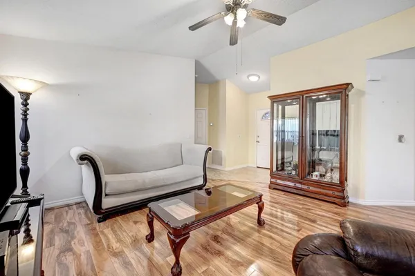 a kitchen with sink cabinets and outdoor space