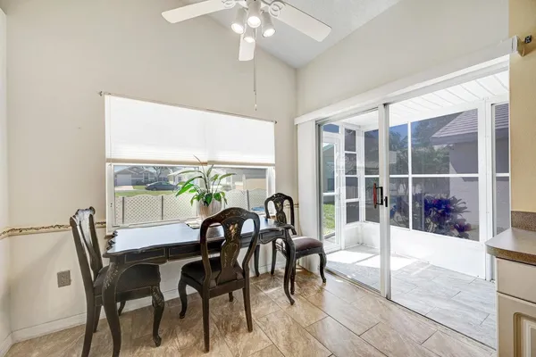 a kitchen with a sink appliances and cabinets
