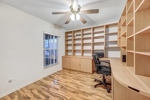 a view of a workspace with furniture