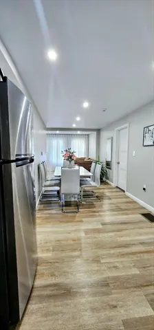 a room with lots of chairs and mirrors