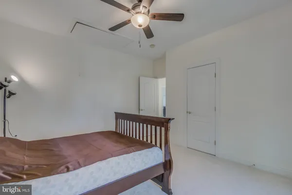 a view of balcony with wooden floor and fence