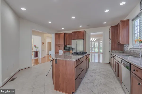 a kitchen with a stove and a sink