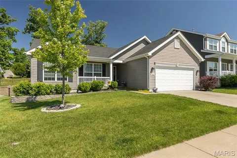 $380,000 | 162 Hidden Bluffs Drive, Lake St. Louis, MO 63367