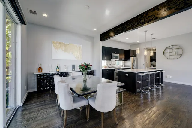 a view of a dining room with furniture