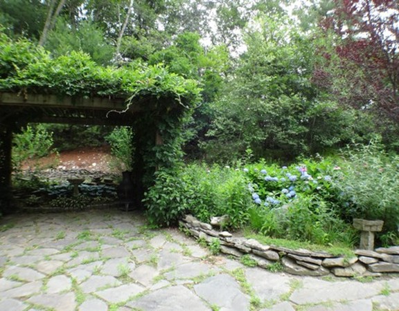 304 Flagg Hill Road Boxborough, MA 01719 - Photo 15 of 20 a view of a garden