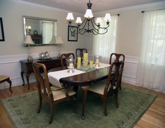 304 Flagg Hill Road Boxborough, MA 01719 - Photo 2 of 20 a view of a dining room with furniture and chandelier