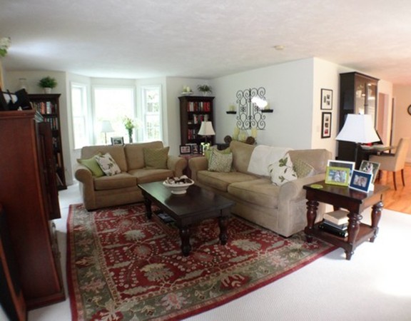 304 Flagg Hill Road Boxborough, MA 01719 - Photo 3 of 20 a living room with furniture and a wooden floor
