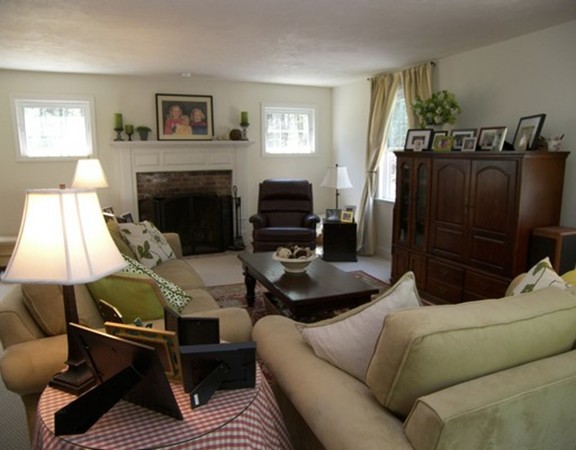 304 Flagg Hill Road Boxborough, MA 01719 - Photo 4 of 20 a living room with furniture and a fireplace