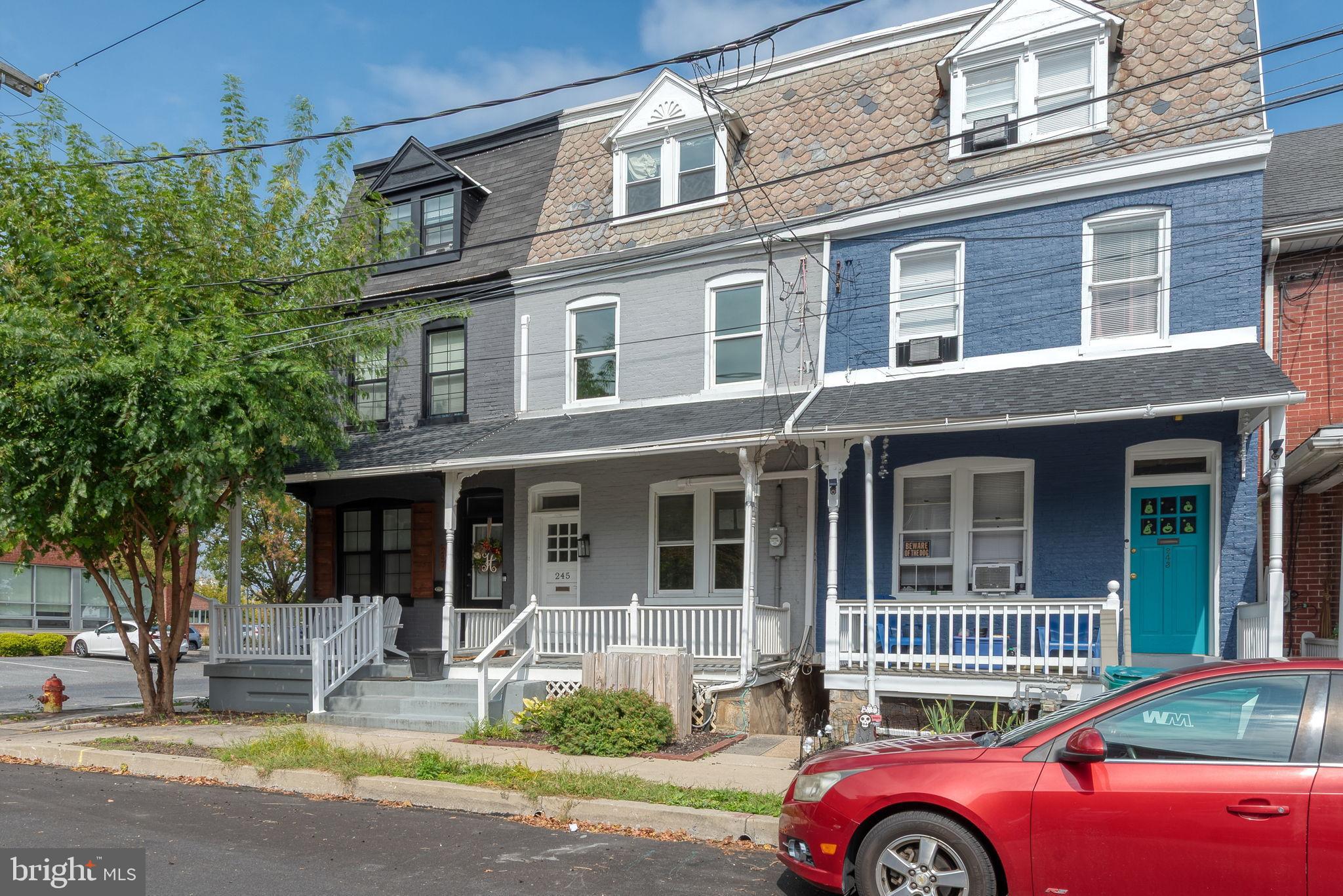 245 Jackson Street Lancaster, PA 17603 - Photo 2 of 38 a front view of a house with a garden