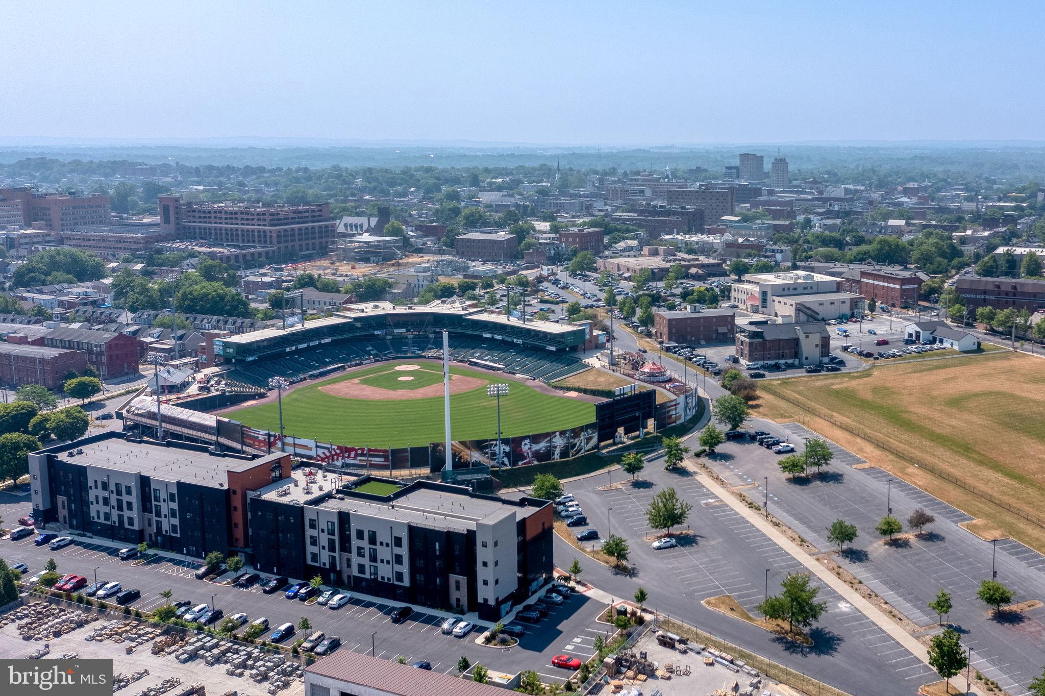 245 Jackson Street Lancaster, PA 17603 - Photo 36 of 38 an aerial view of a house with a swimming pool yard and outdoor seating