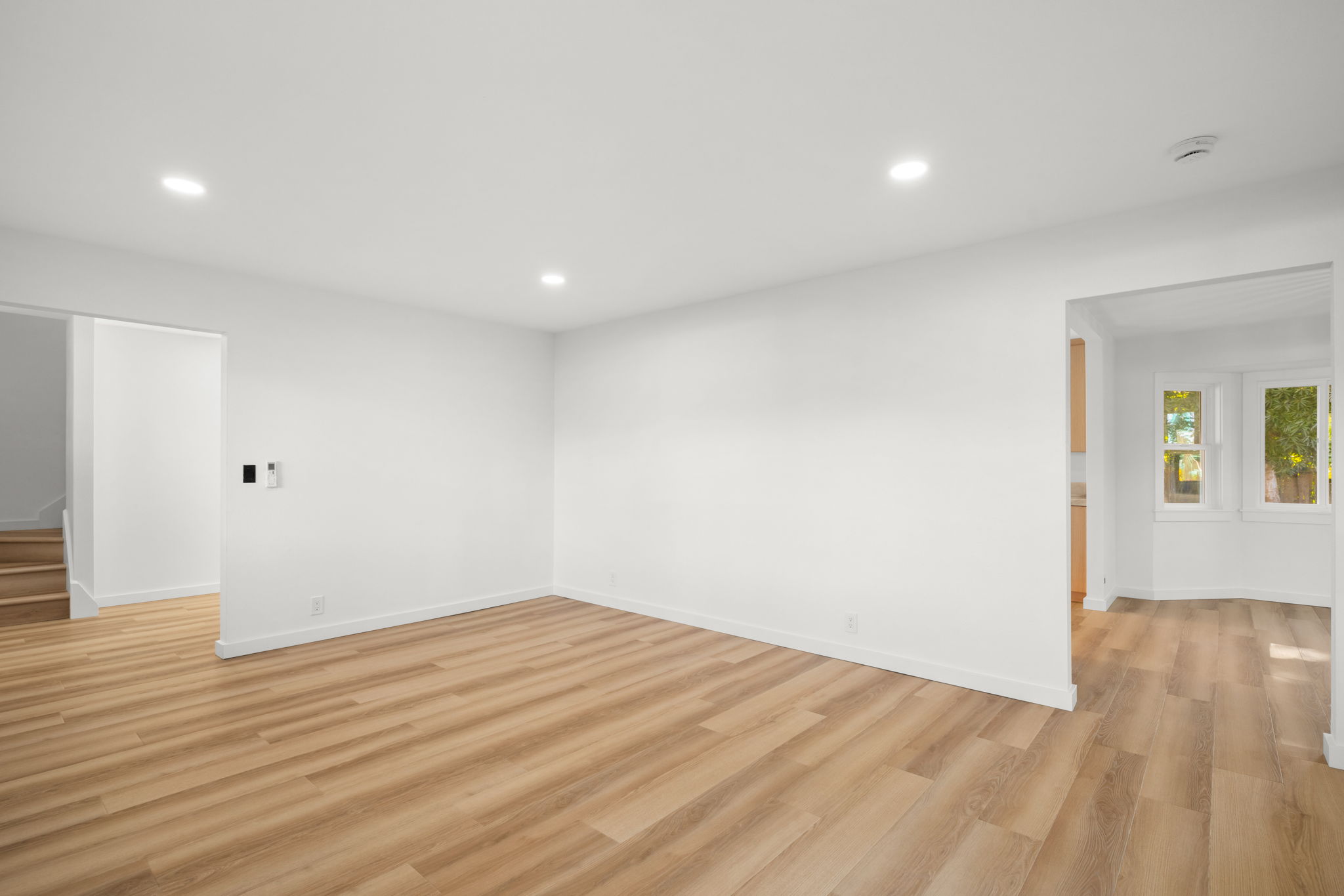 5611 Ohelo Road Kapaa, HI 96746 - Photo 2 of 30 an empty room with wooden floor and windows