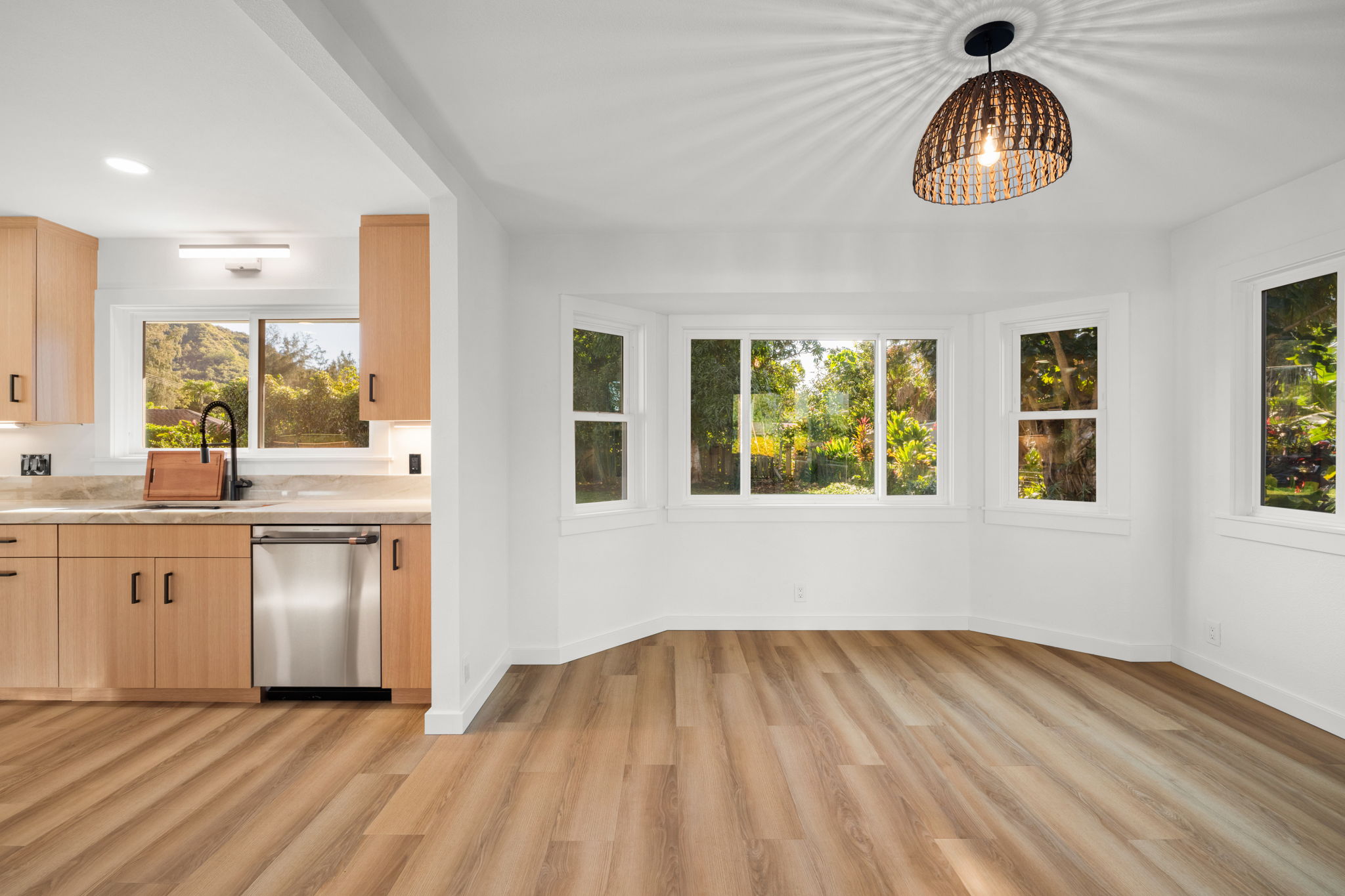 5611 Ohelo Road Kapaa, HI 96746 - Photo 10 of 30 a view of an empty room with window and wooden floor
