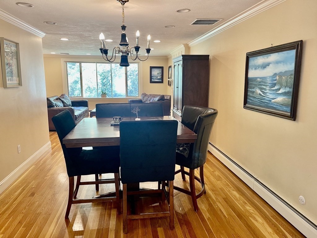 17 Rutgers Road Andover, MA 01810 - Photo 8 of 36 a view of a dining room with furniture window and wooden floor