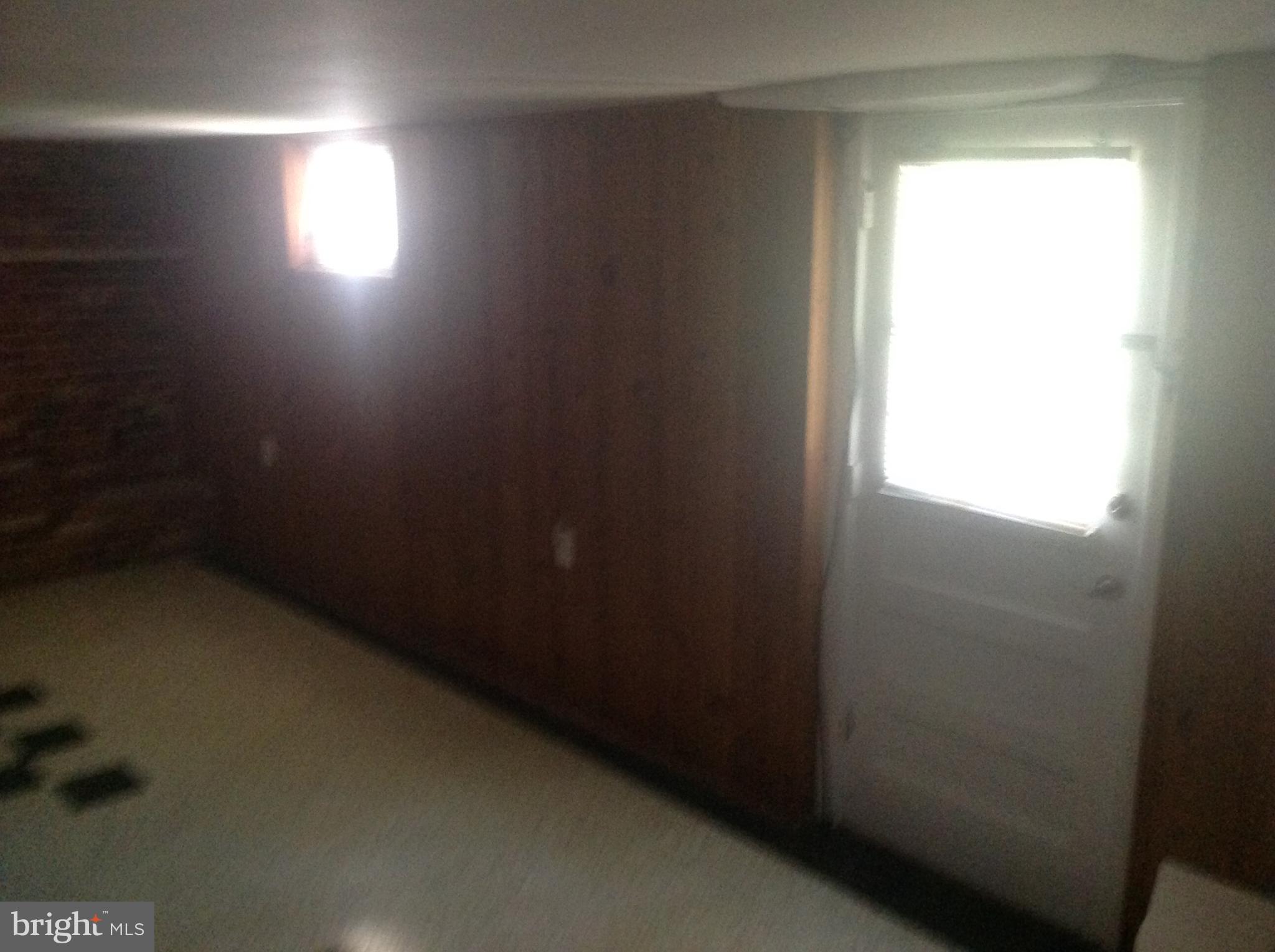 1205 Highwood Road Rockville, MD 20851 - Photo 12 of 12 a empty room with windows