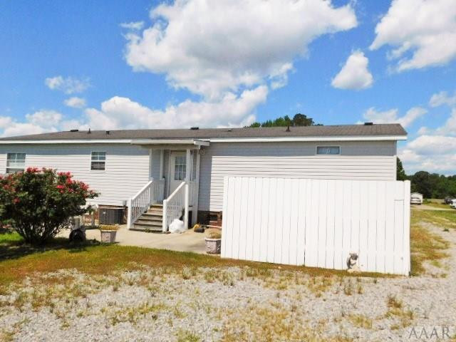 113 Smith Acres Road Hertford, NC 27944 - Photo 15 of 20 Back view of vinyl fence by the patio