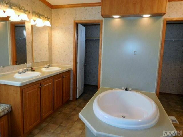 113 Smith Acres Road Hertford, NC 27944 - Photo 7 of 20 Master bath with soaking tub and dual vanities