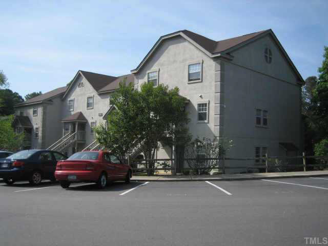 a car parked in front of a house