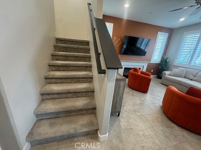 2315 Powell Drive Rialto, CA 92377 - Photo 20 of 27 a living room with furniture and a flat screen tv