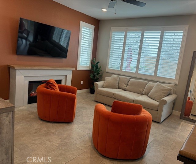 2315 Powell Drive Rialto, CA 92377 - Photo 21 of 27 a living room with furniture and a flat screen tv
