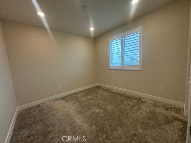 2315 Powell Drive Rialto, CA 92377 - Photo 25 of 27 an empty room with a window
