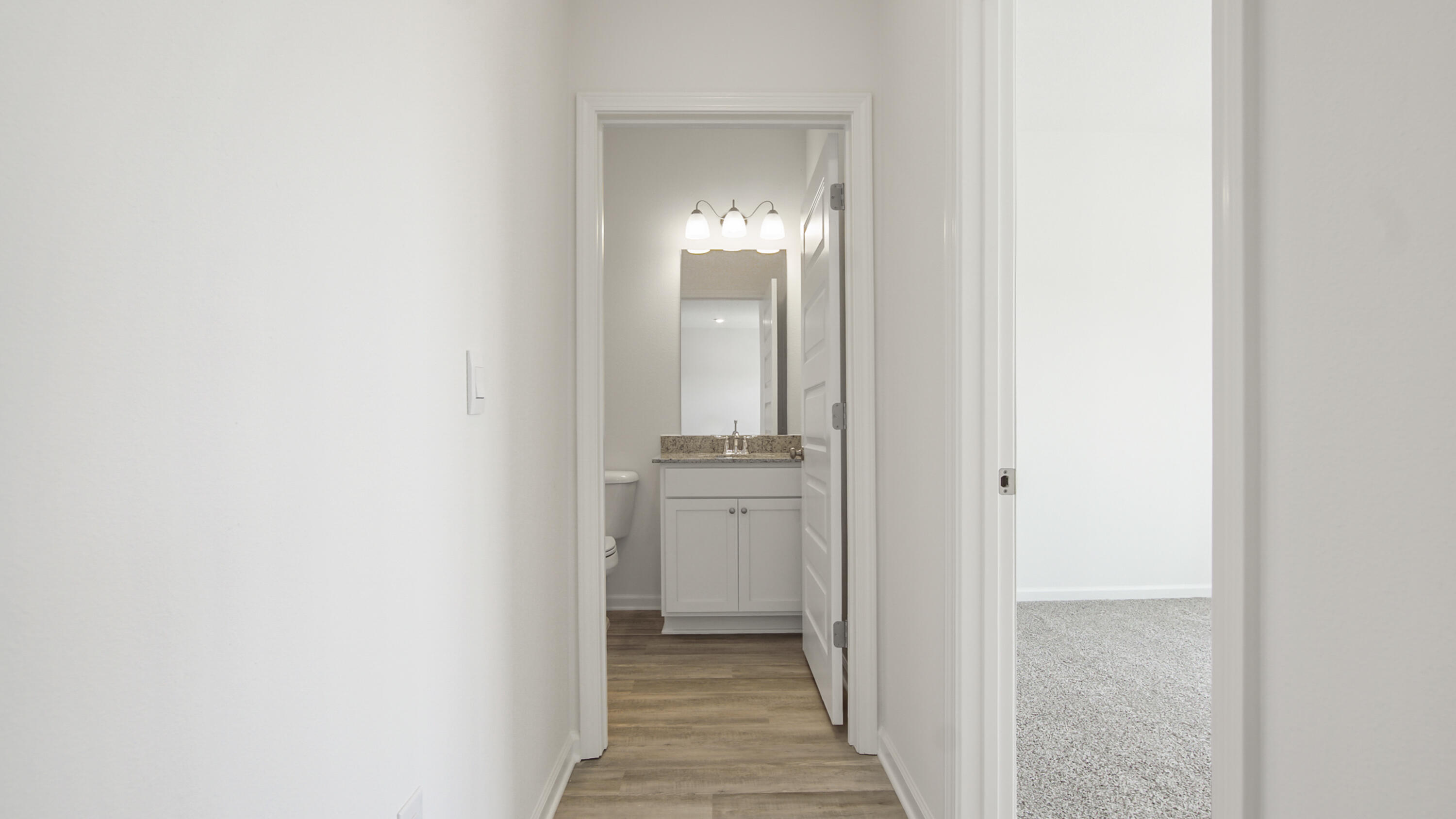 73 Huckleberry Street Freeport, FL 32439 - Photo 6 of 34 a en suite bathroom with a sink