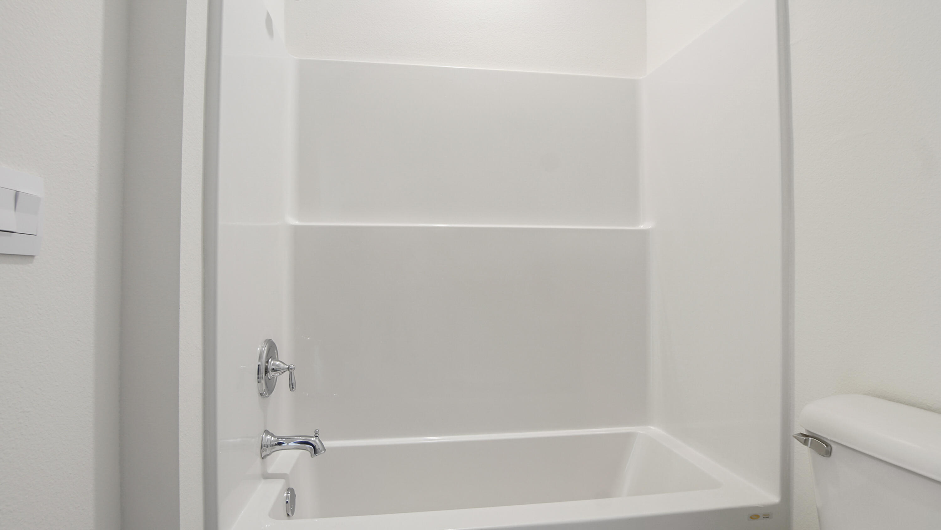 73 Huckleberry Street Freeport, FL 32439 - Photo 8 of 34 a close up view of a bathtub