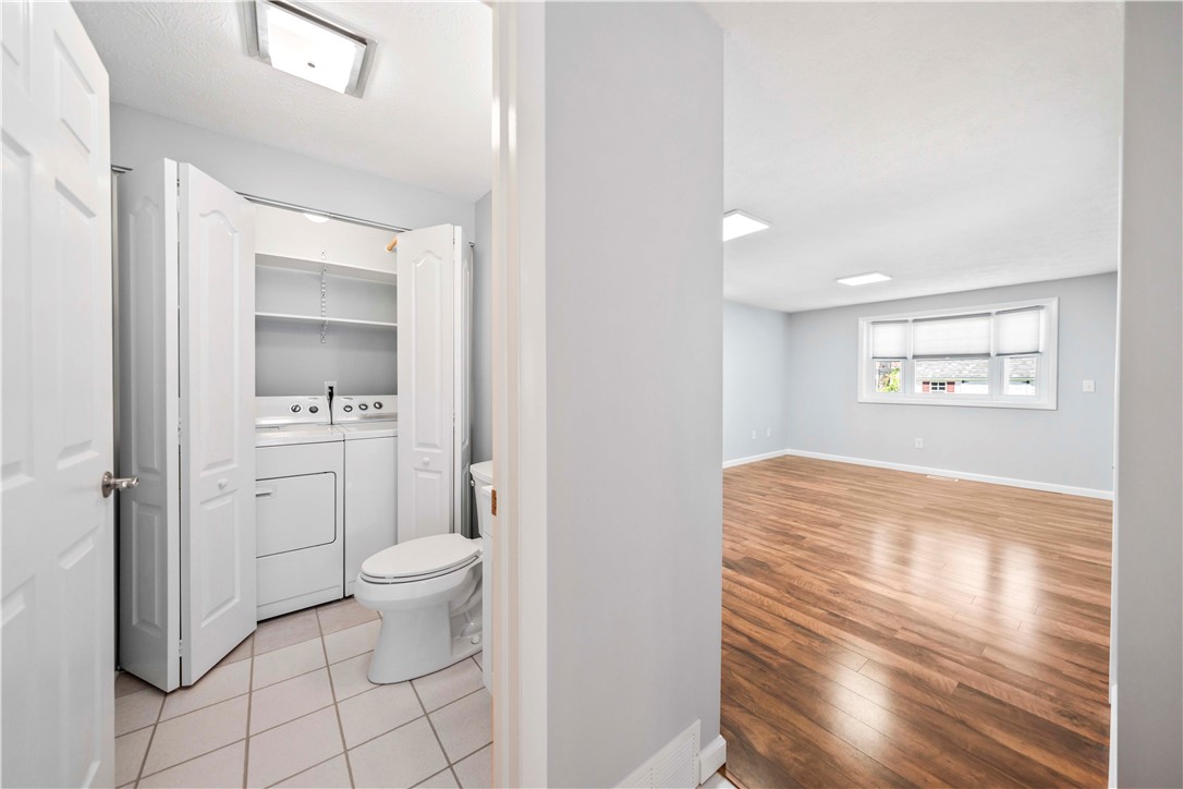 118 Queensboro Road Irondequoit, NY 14609 - Photo 12 of 40 1st floor laundry and powder room off kitchen