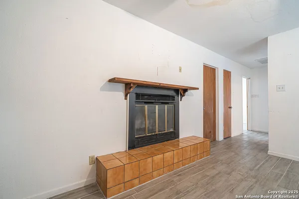a bathroom with a sink toilet tub and shower