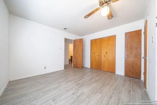 a view of a hallway with closet
