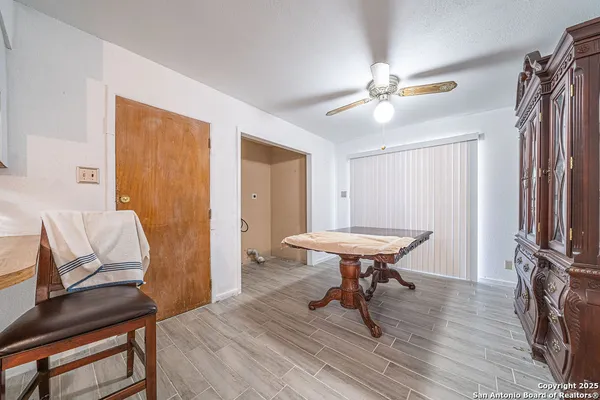 a view of a livingroom with furniture and a table