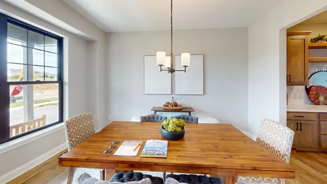 a living room with dining table
