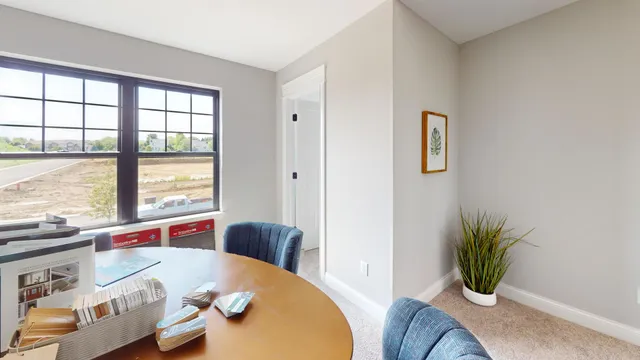 a living room with furniture and window