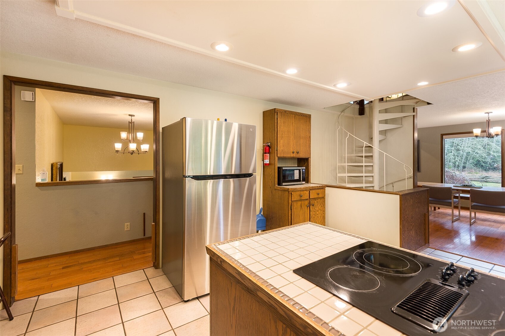 3547 Deer Park Road Port Angeles, WA 98362 - Photo 15 of 37 a kitchen with a stove and a refrigerator