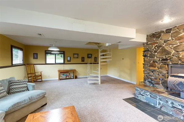 a living room with furniture and a table