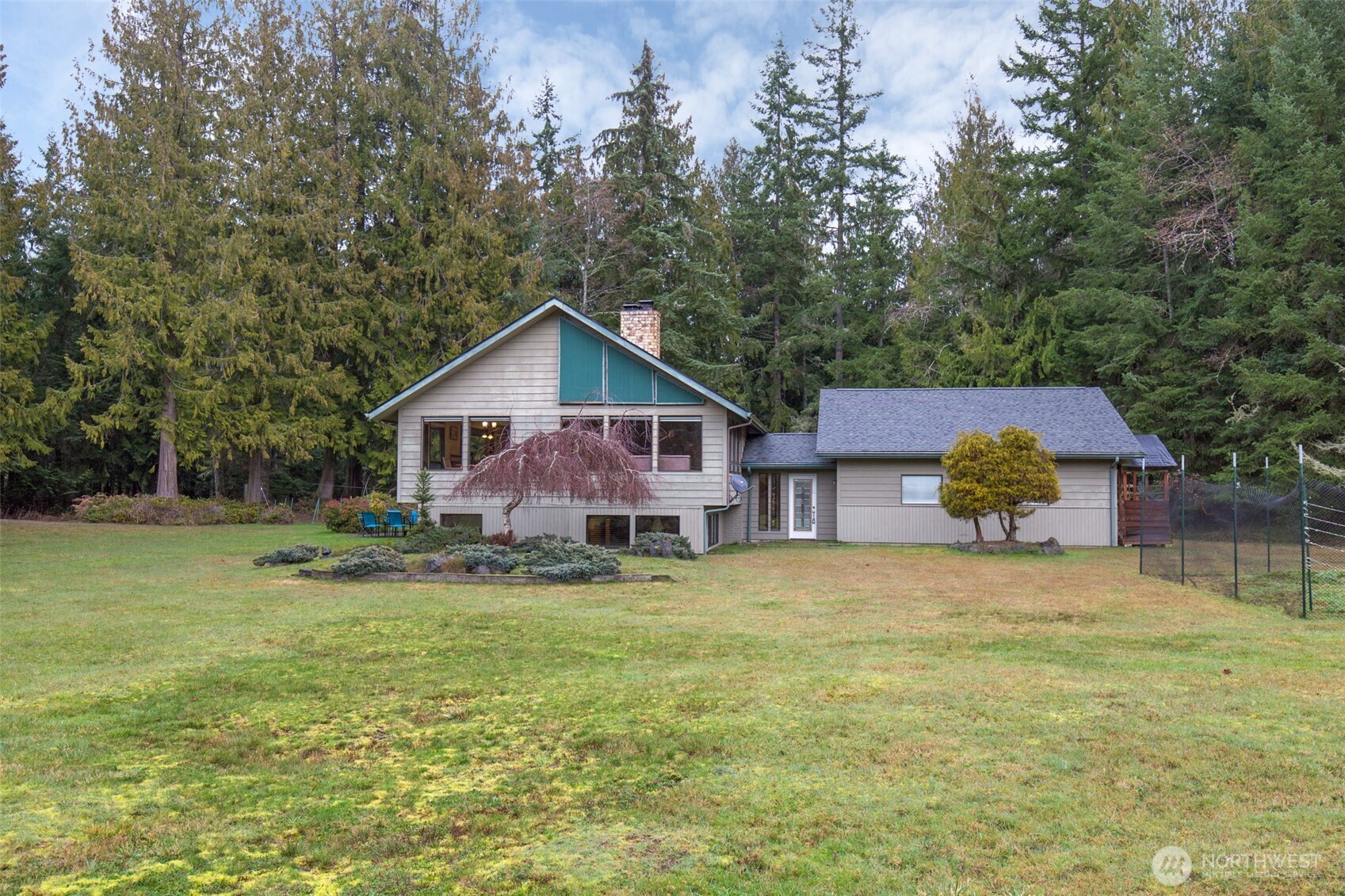 3547 Deer Park Road Port Angeles, WA 98362 - Photo 35 of 37 a view of a house with a yard