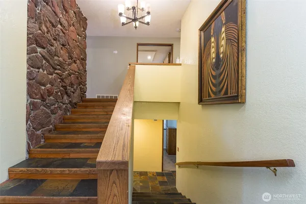 a view of entryway with wooden floor